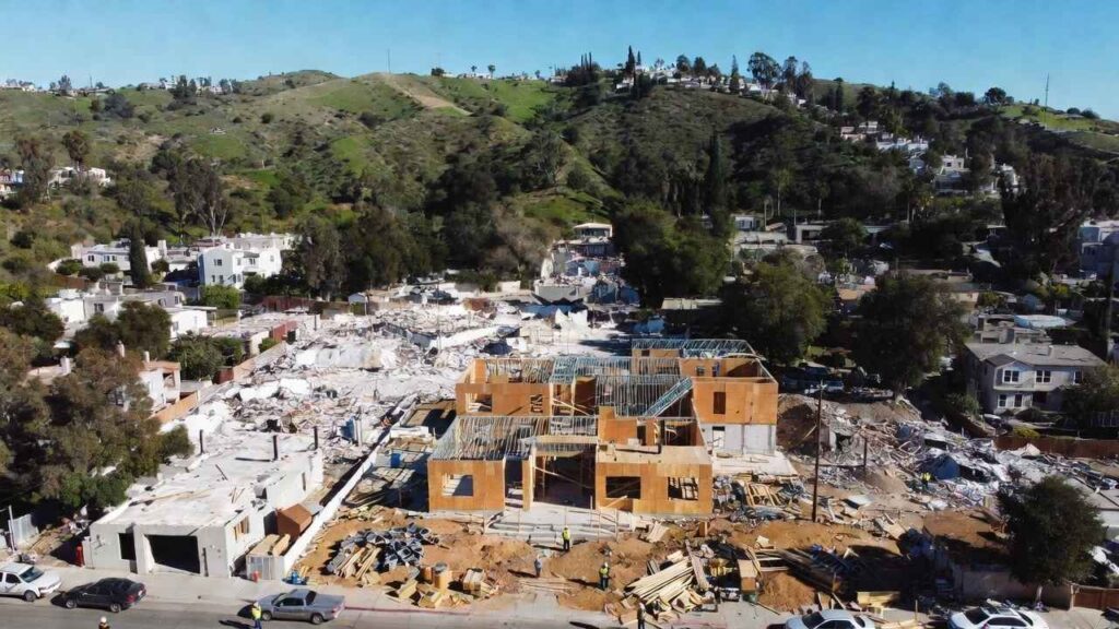 Aerial-view-of-Los-Angeles-wildfire-recovery-and-rebuilding-efforts-one-year-after-devastating-Palisades-and-Eaton-fires-in-2026